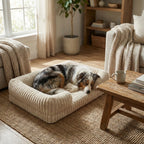 couchage pour chien en tissu doux avec rebords volumineux et centre plat