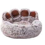 Chien reposant dans un lit rond apaisant Dododog
