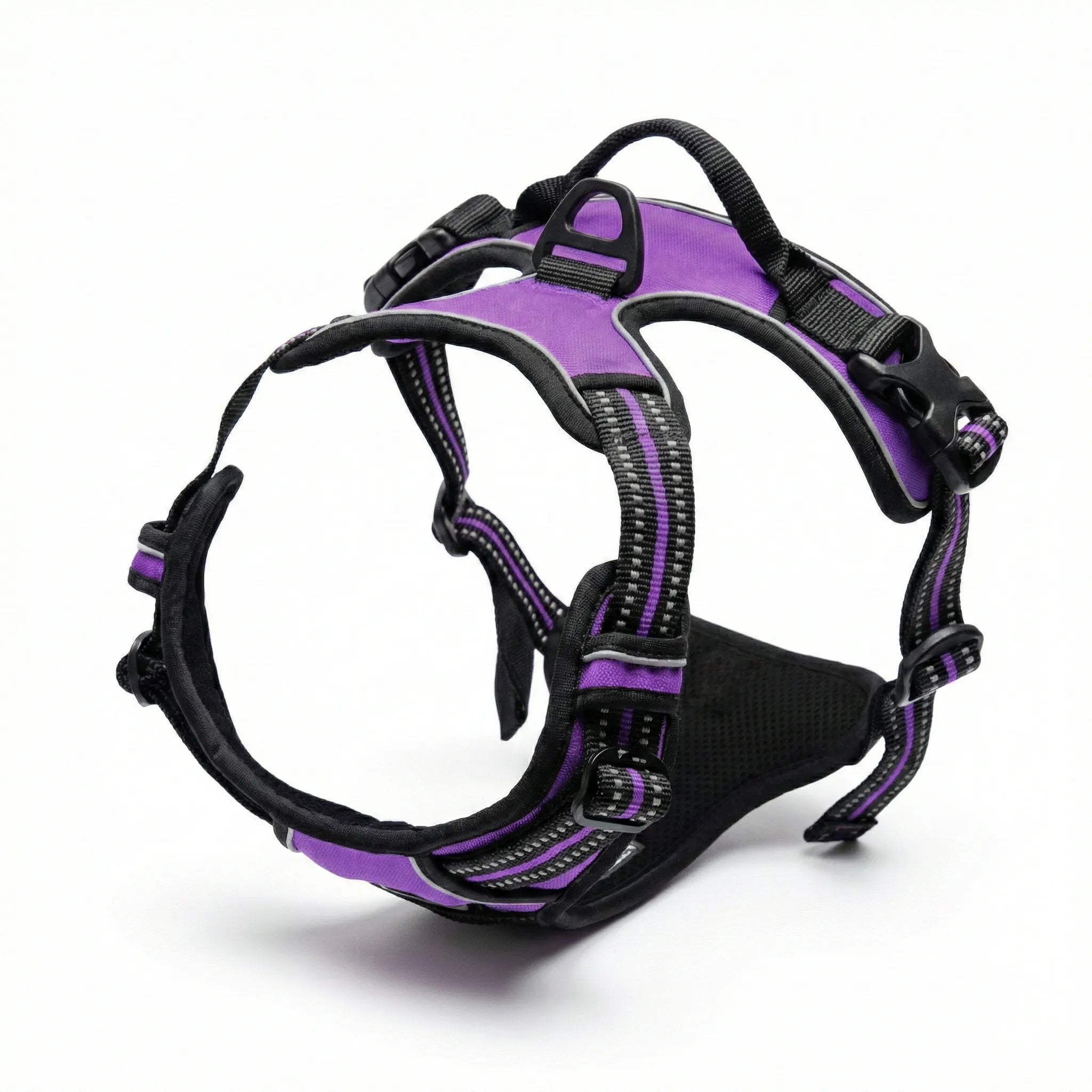 Harnais réglable pour chien avec boucles de fermeture rapides en plastique noir et plusieurs points d'ajustement pour s'adapter à toutes les morphologies.