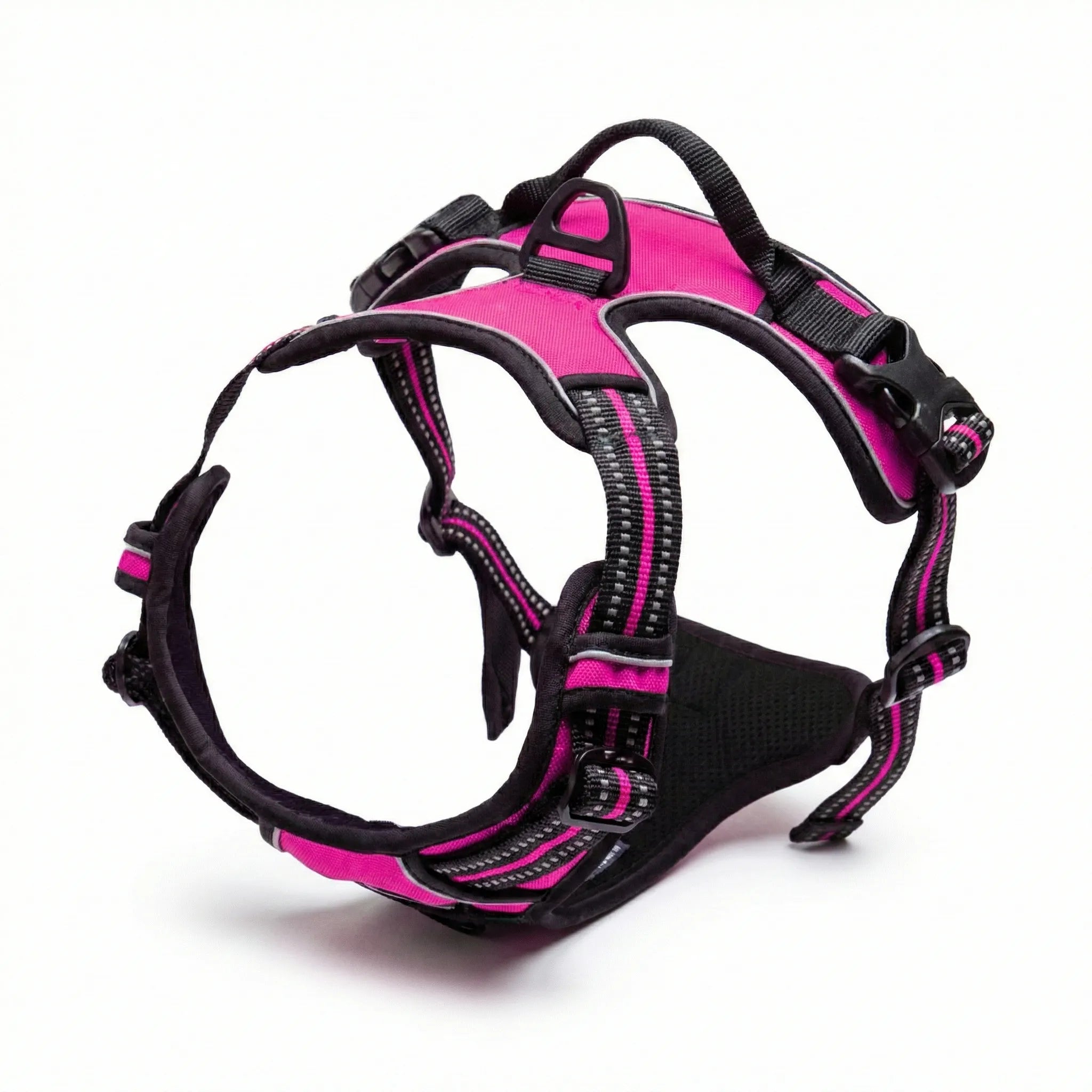 Harnais de type sport pour chien, coloris rose et noir, structure résistante adaptée aux randonnées et aux activités de plein air.
