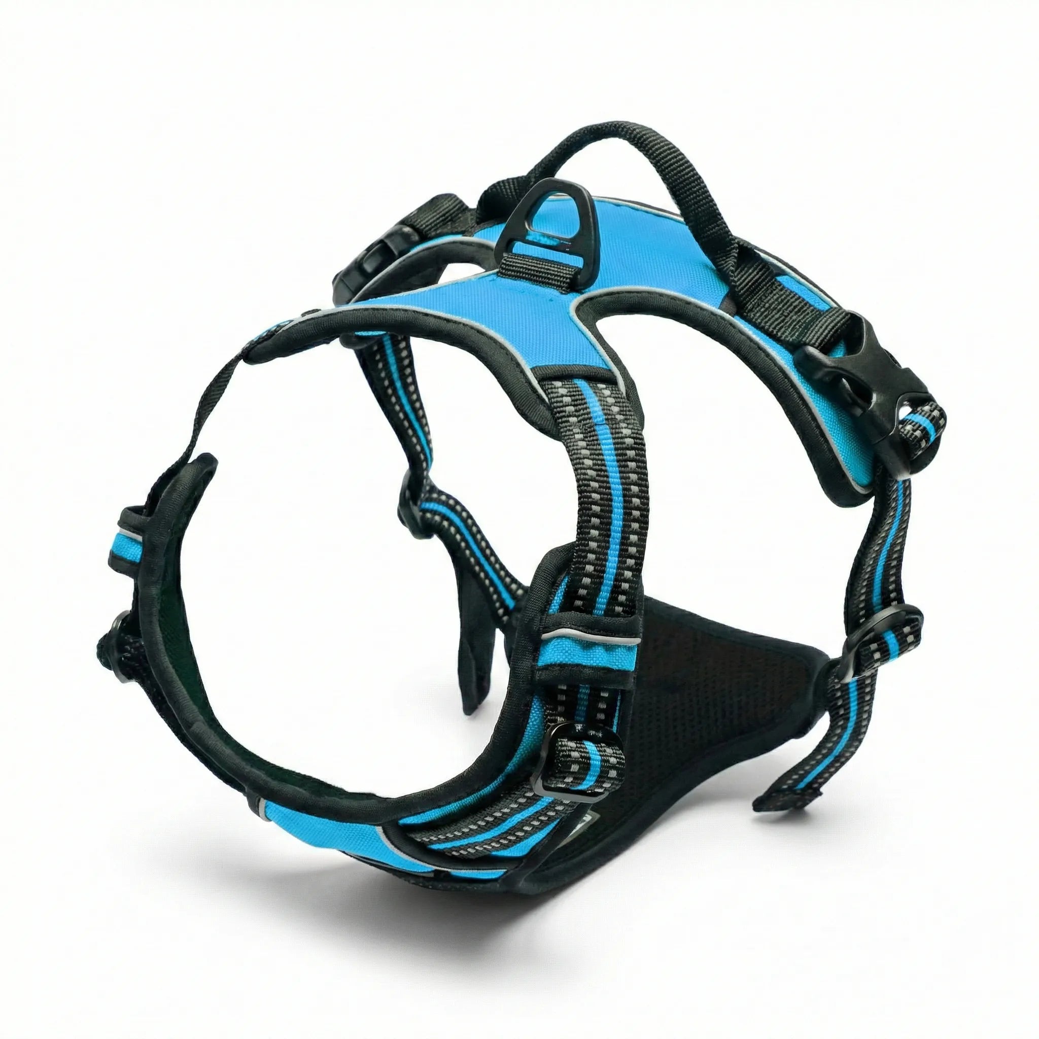 Harnais ergonomique pour chien de couleur rose vif avec sangles noires et bordures réfléchissantes, présenté de profil sur un fond blanc pur.