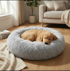 Panier nid douillet pour animal de compagnie, design rond avec rebords surélevés pour un sentiment de sécurité.